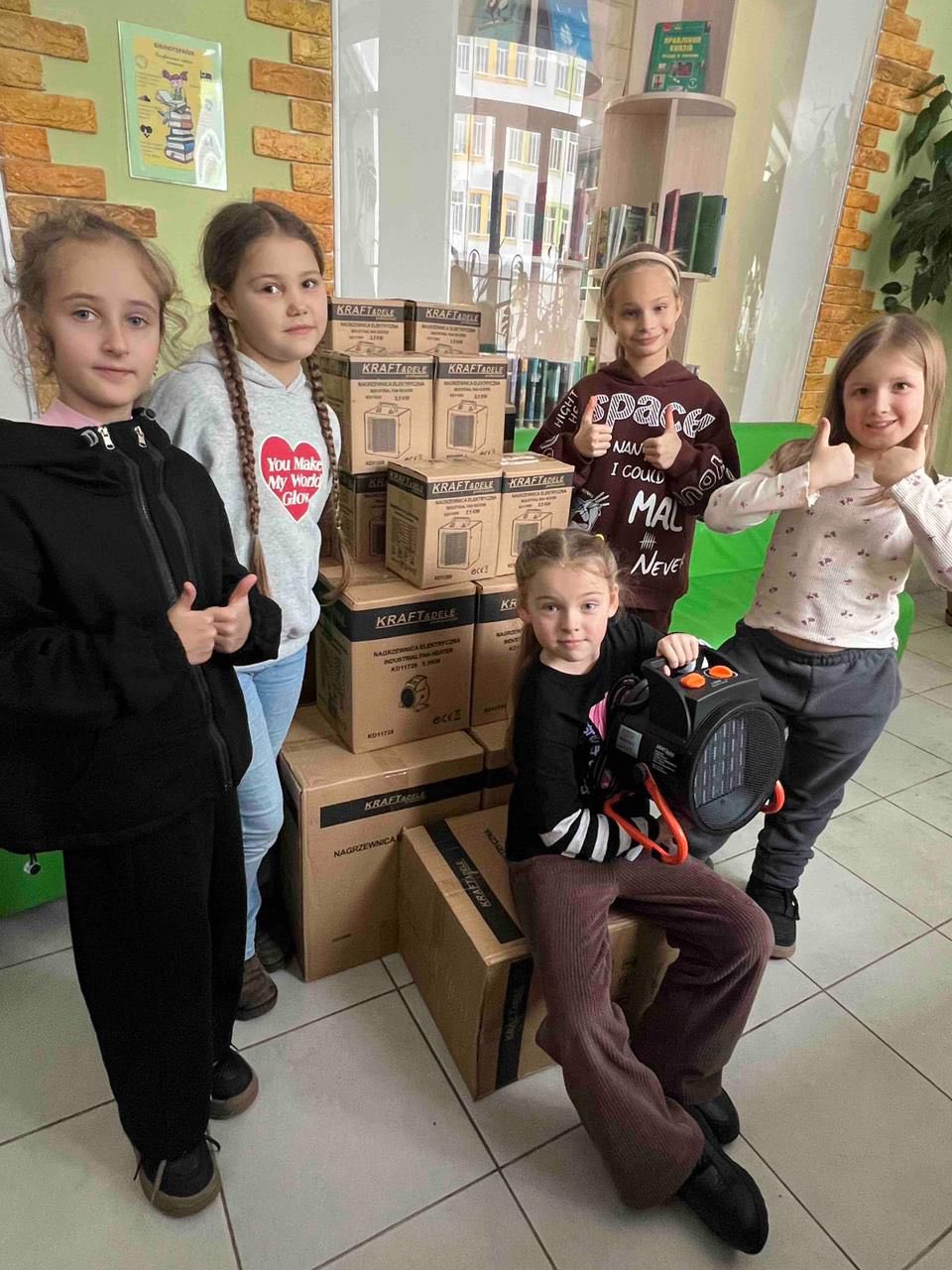 Передача генераторів та обігрівачів Подільському районові Києва, 6 лютого 2026 року.